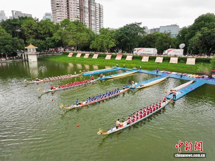 逾1400名龙舟健儿逐浪羊城